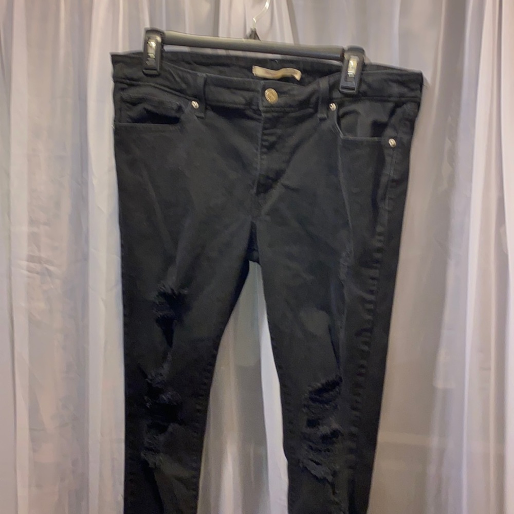#75 Woman’s black skinny jeans